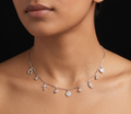 Multiple small dangling charms