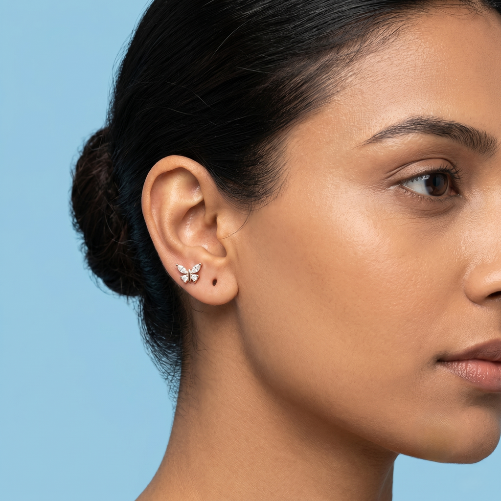 Rose gold butterfly second stud