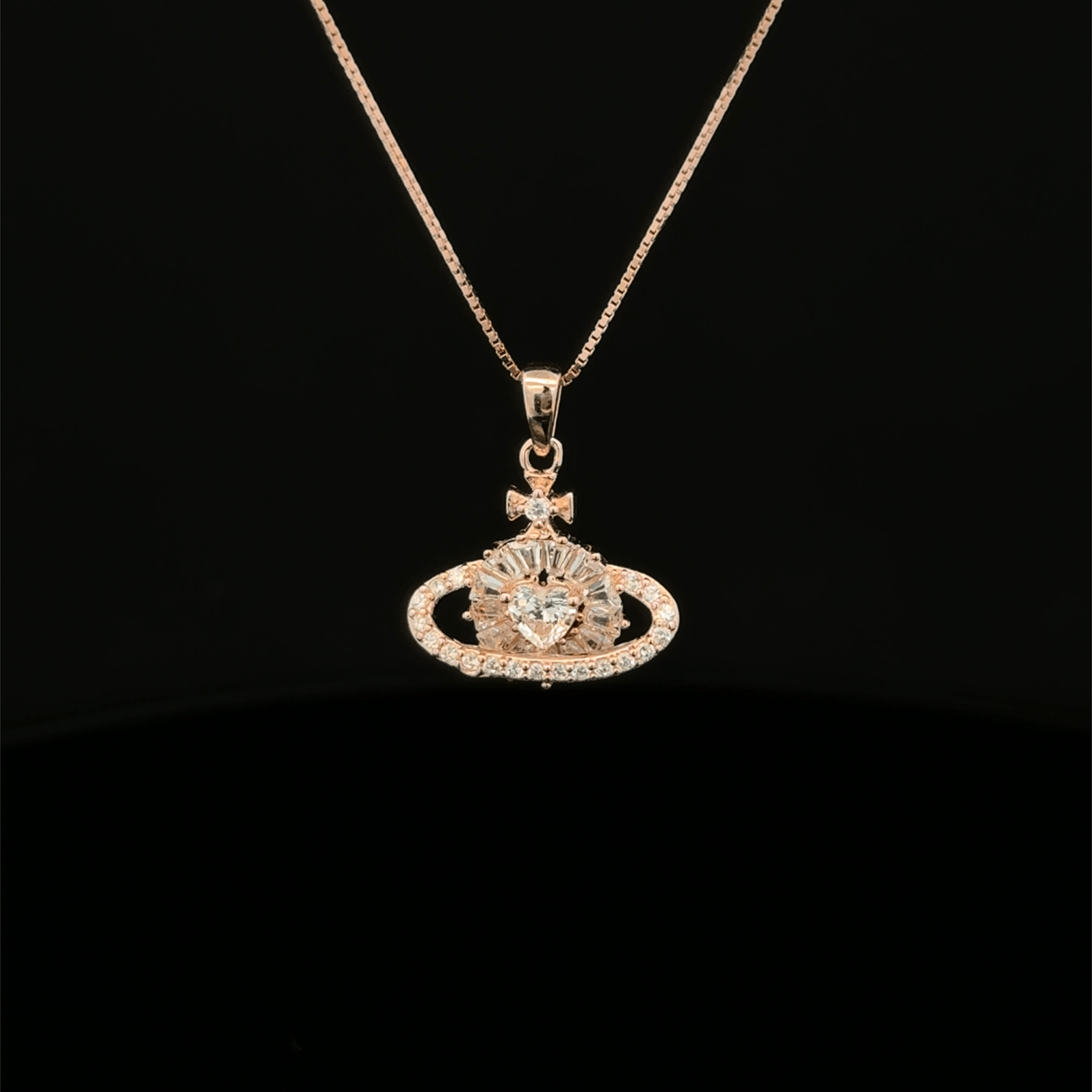 Planet Heart rose gold chain pendant