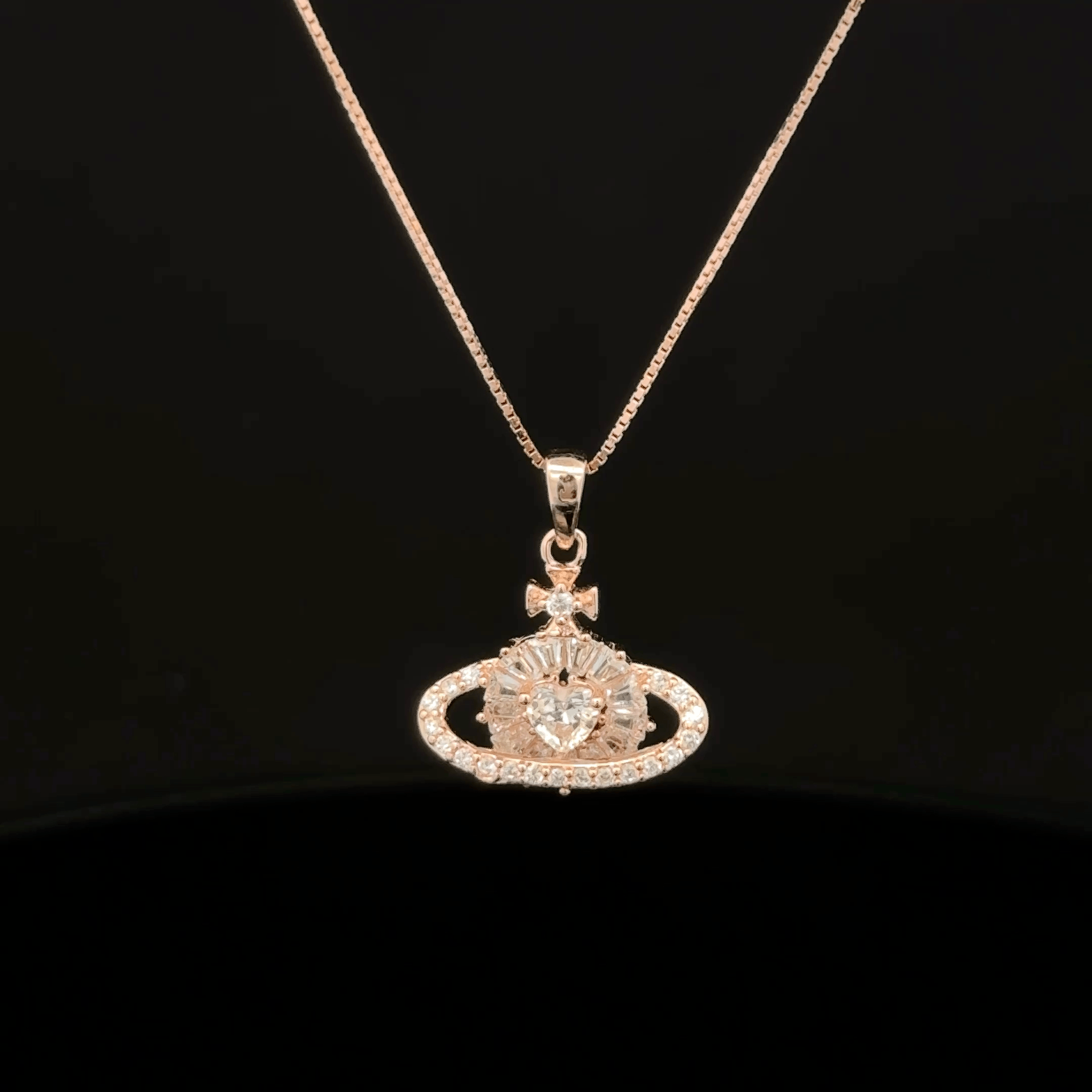 Planet Heart rose gold chain pendant