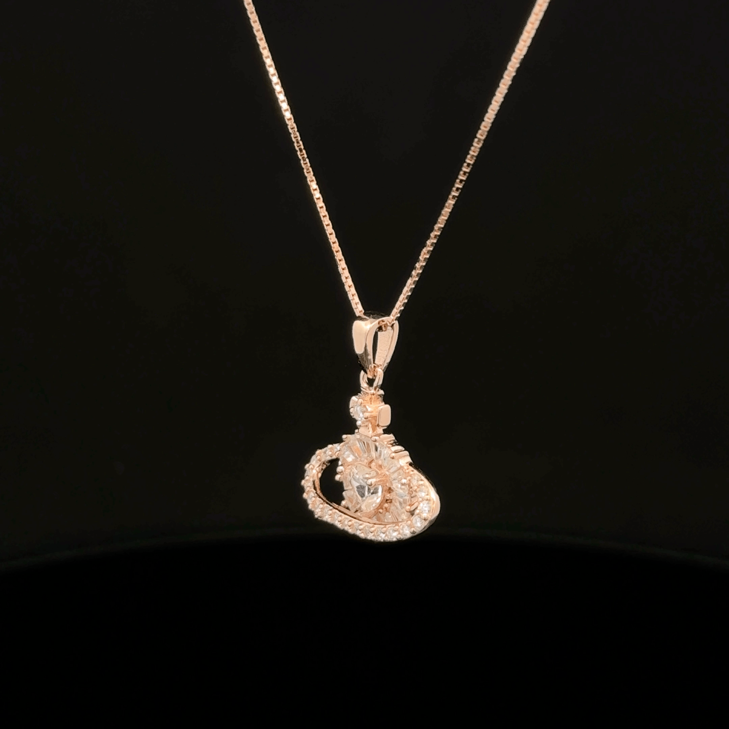 Planet Heart rose gold chain pendant