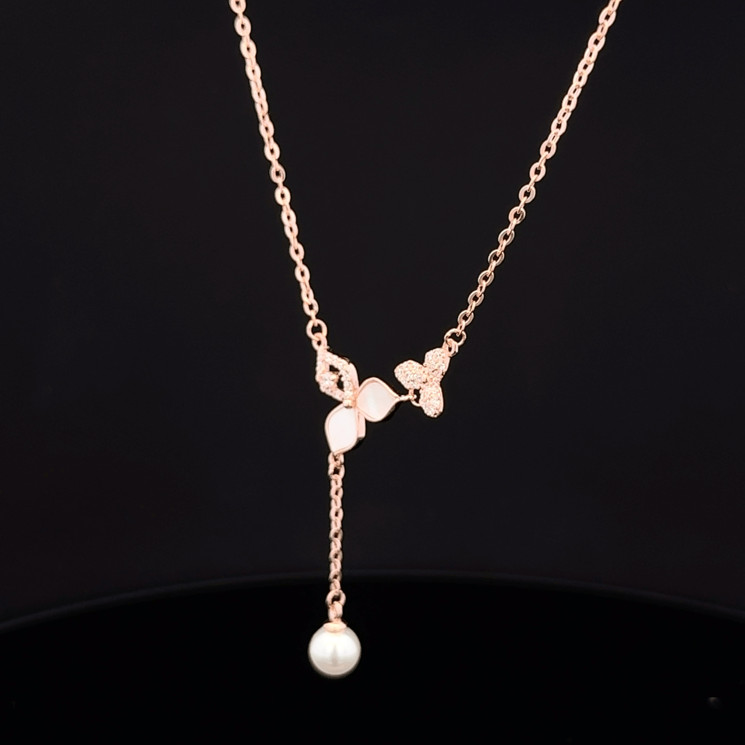 Flower and pearl drop rose gold chain pendant