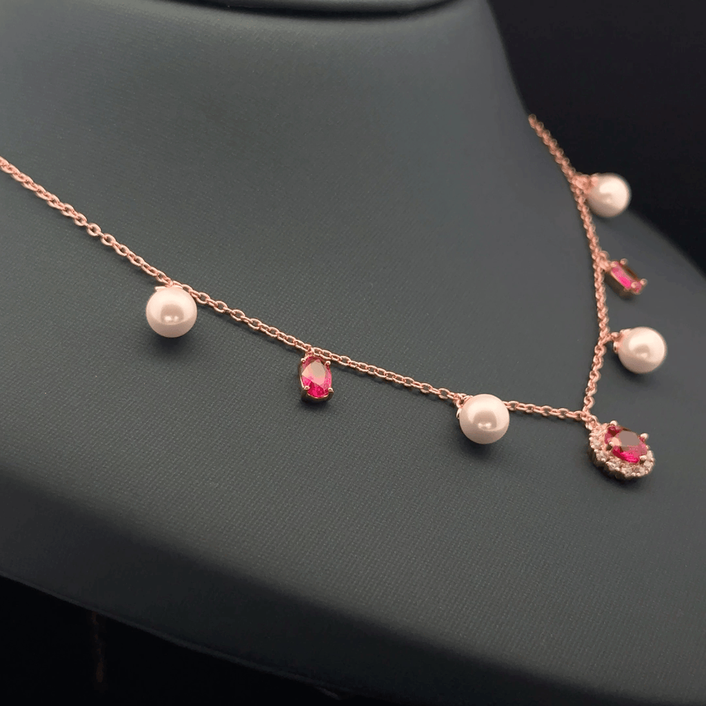 Pearl with pink stone