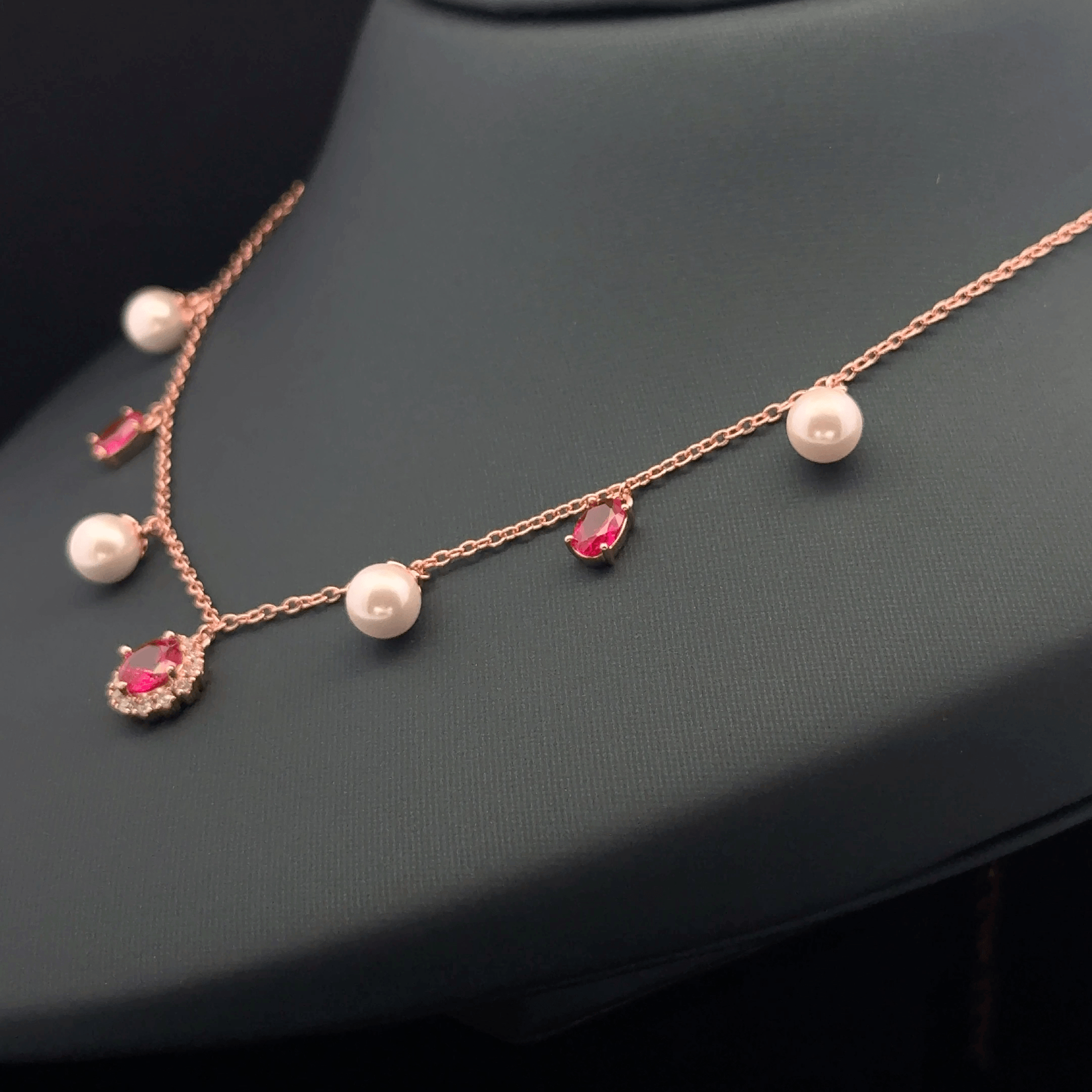 Pearl with pink stone