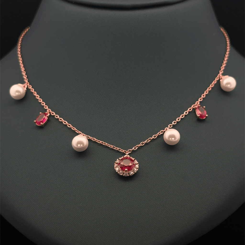 Pearl with pink stone