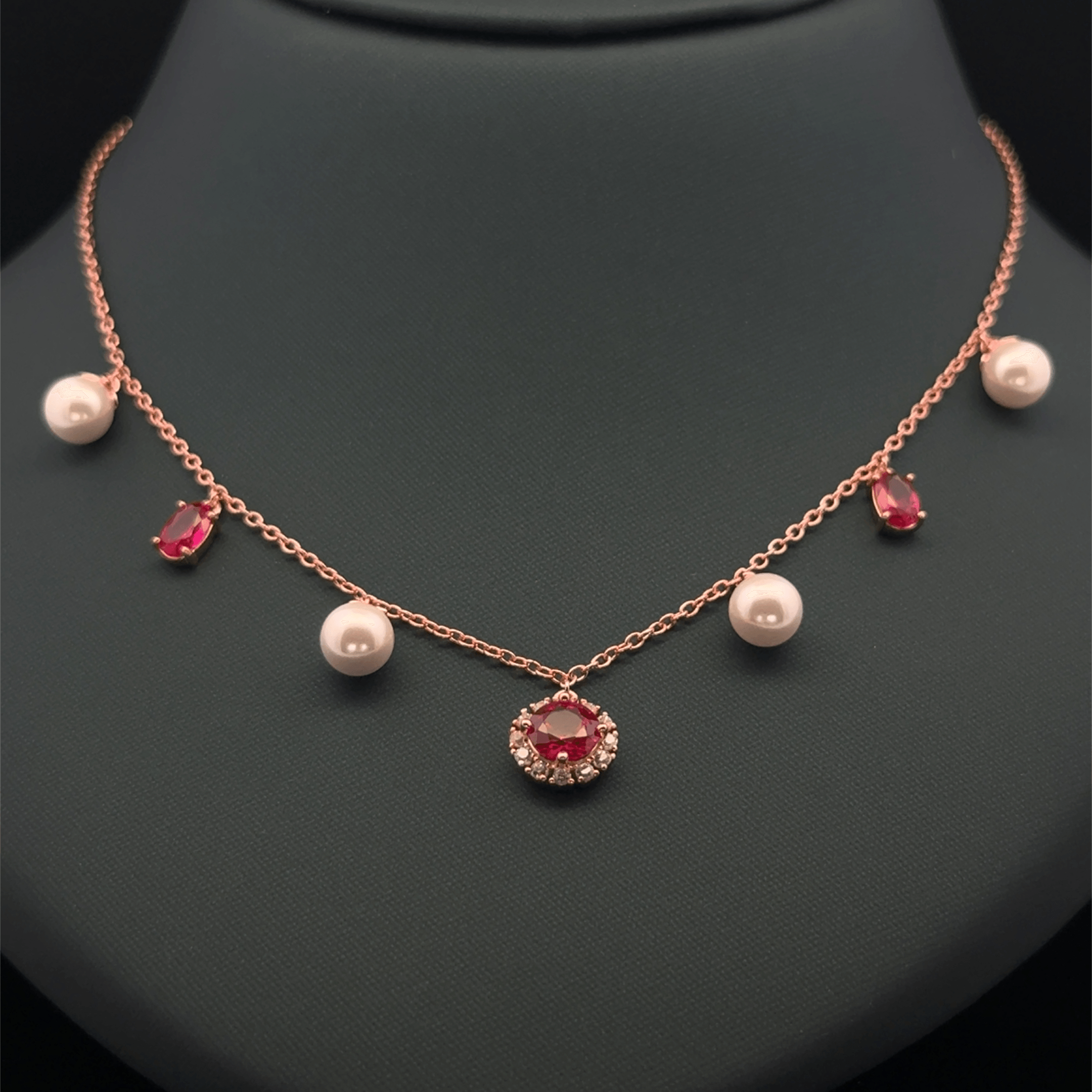Pearl with pink stone
