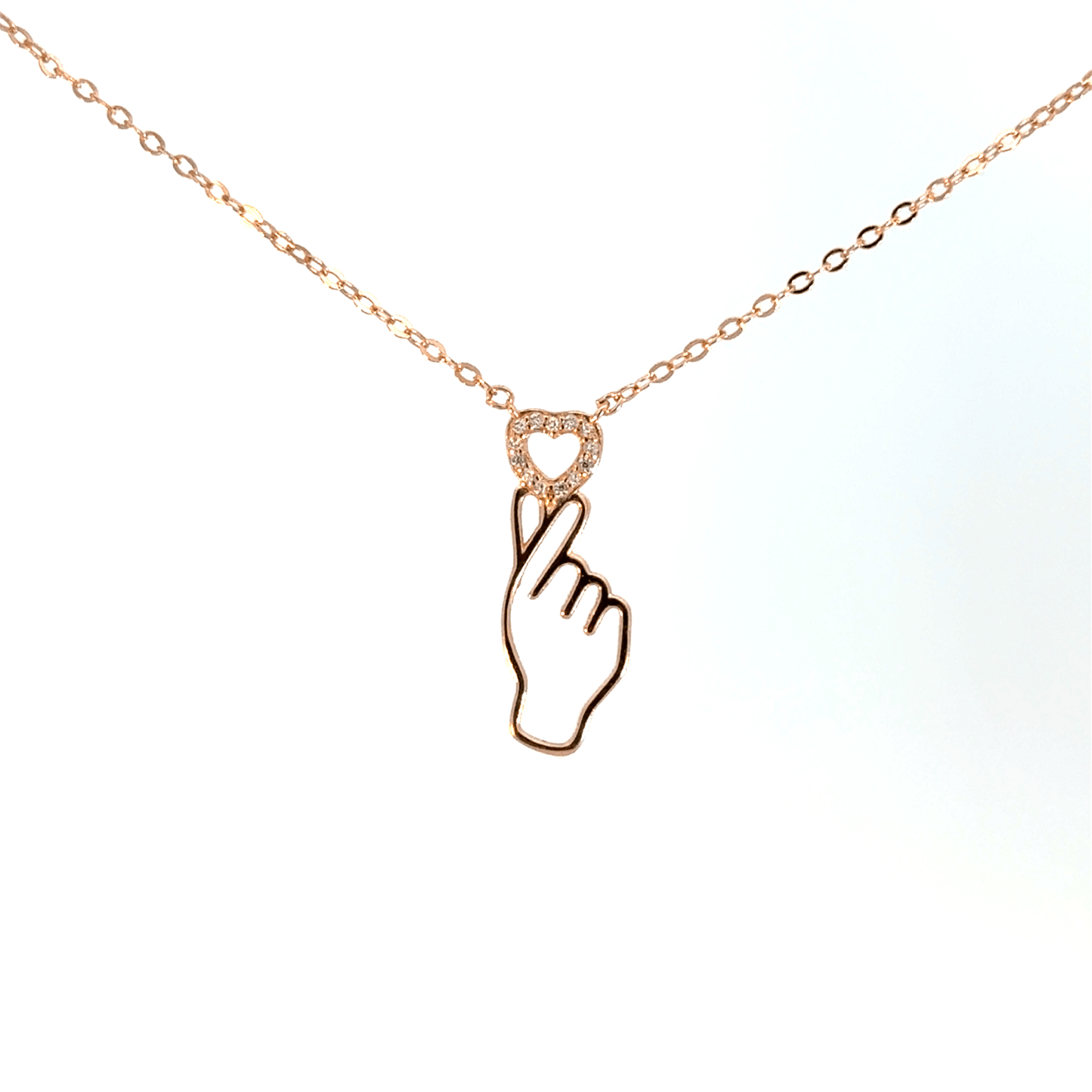 Rosegold heart in finger chain with pendent
