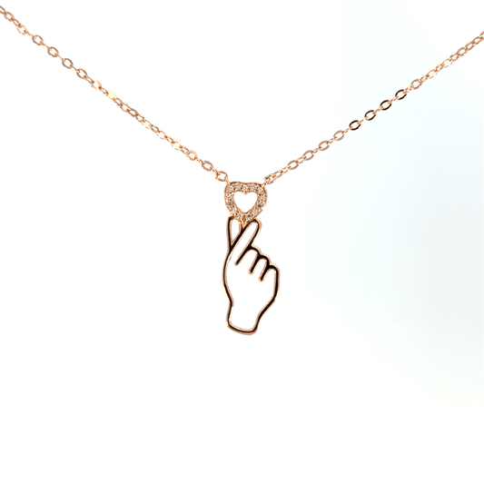 Rosegold heart in finger chain with pendent