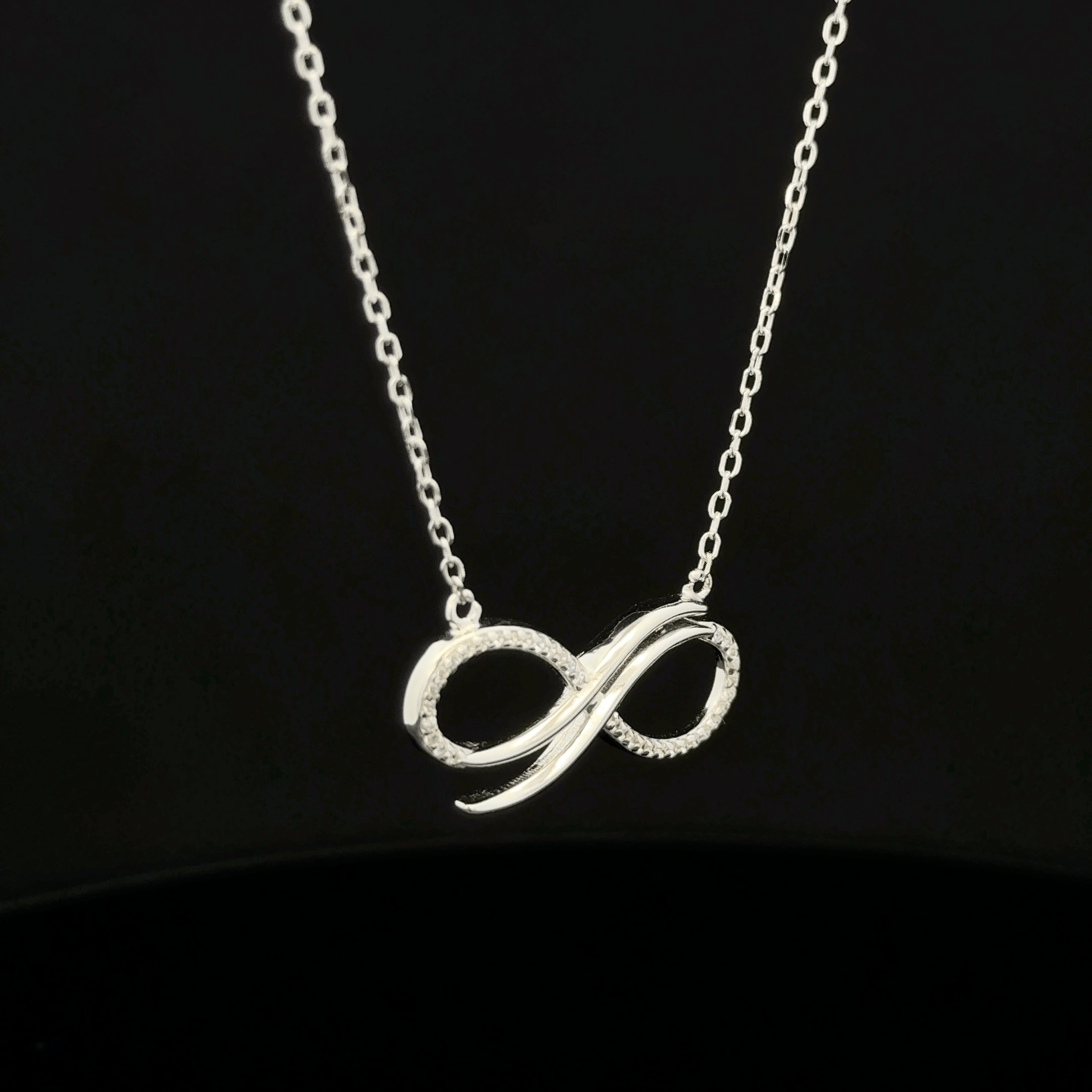 The Infinite Sparkle Twist Pendant