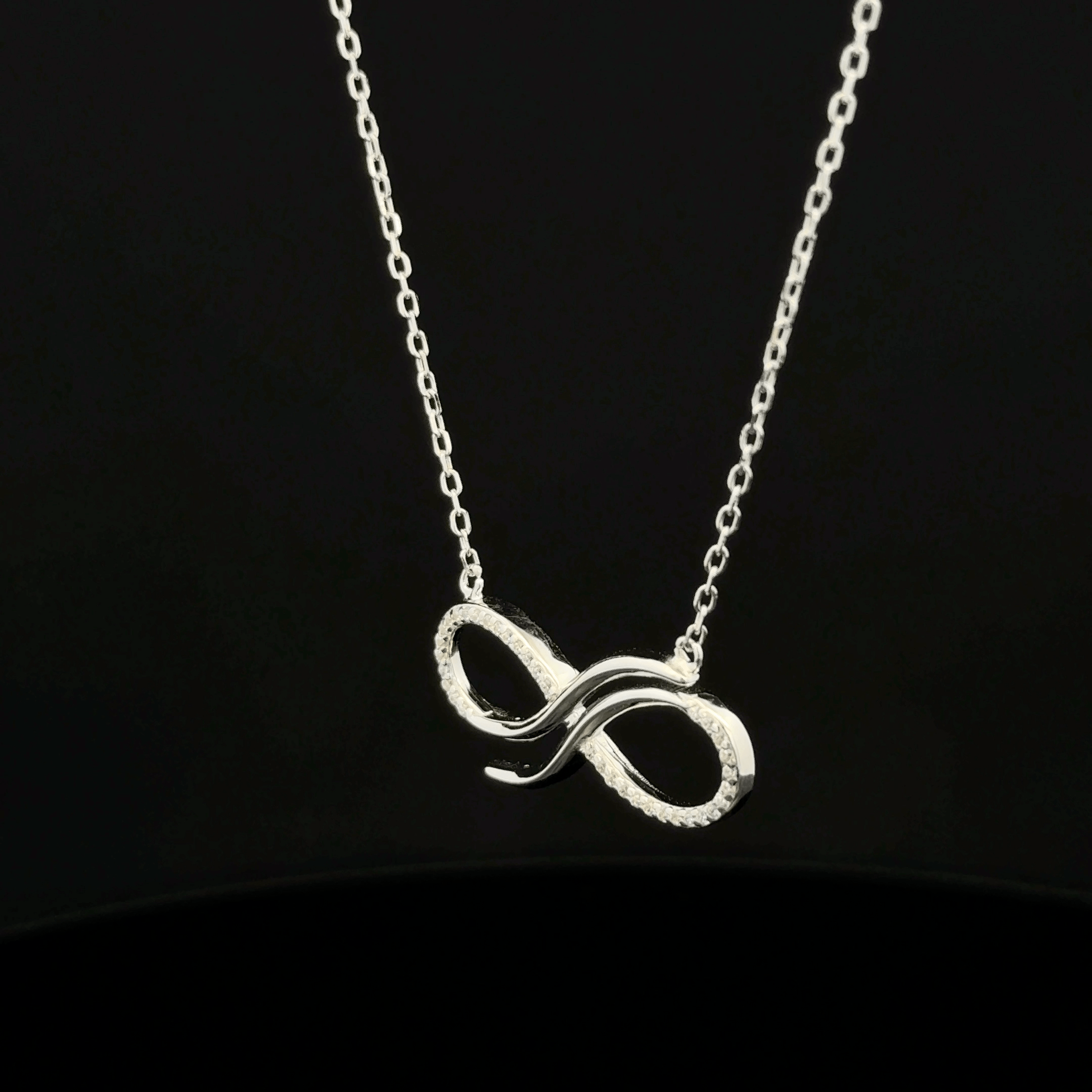 The Infinite Sparkle Twist Pendant