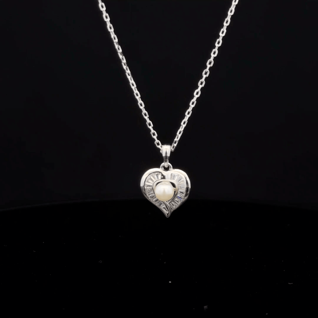 Heart with pearl