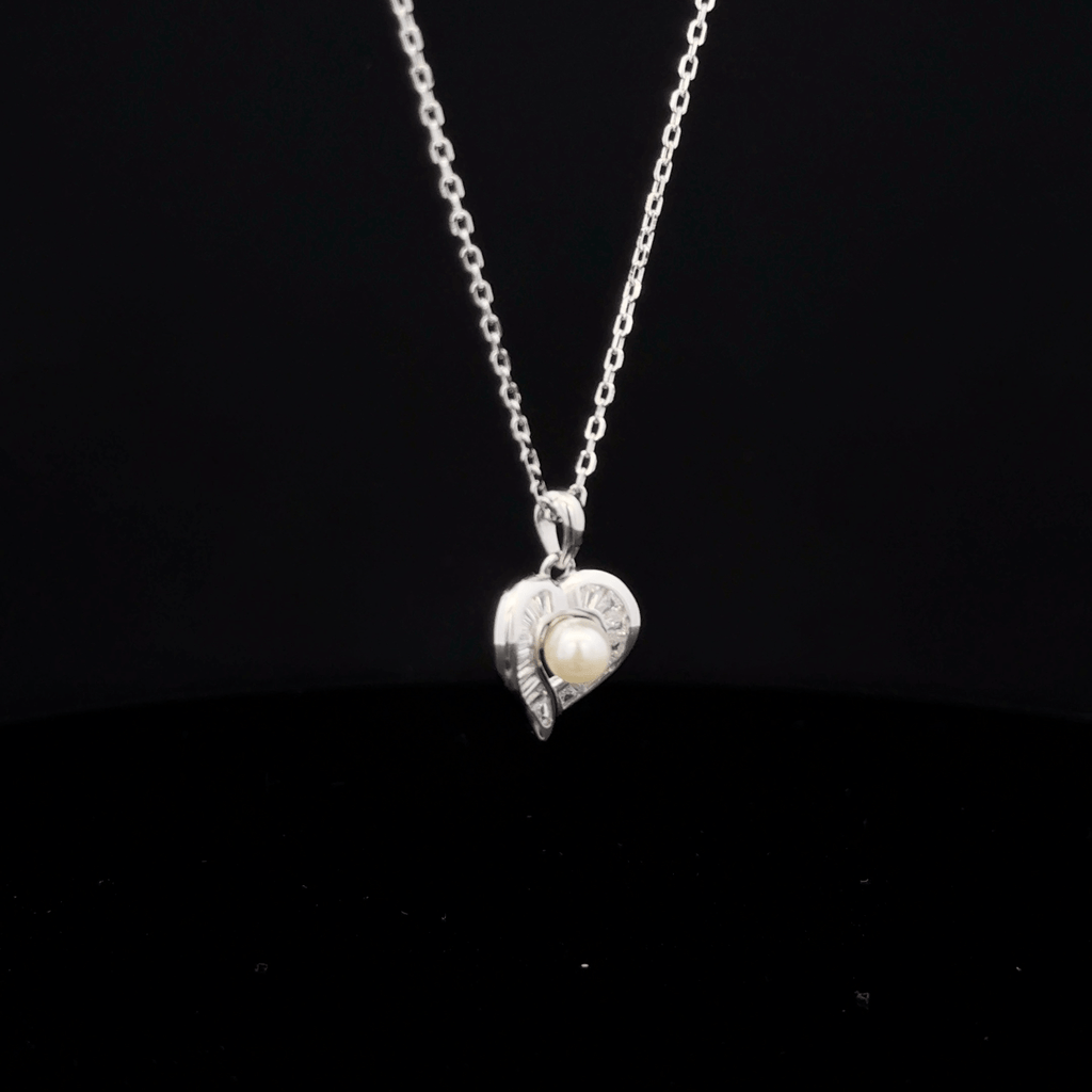 Heart with pearl