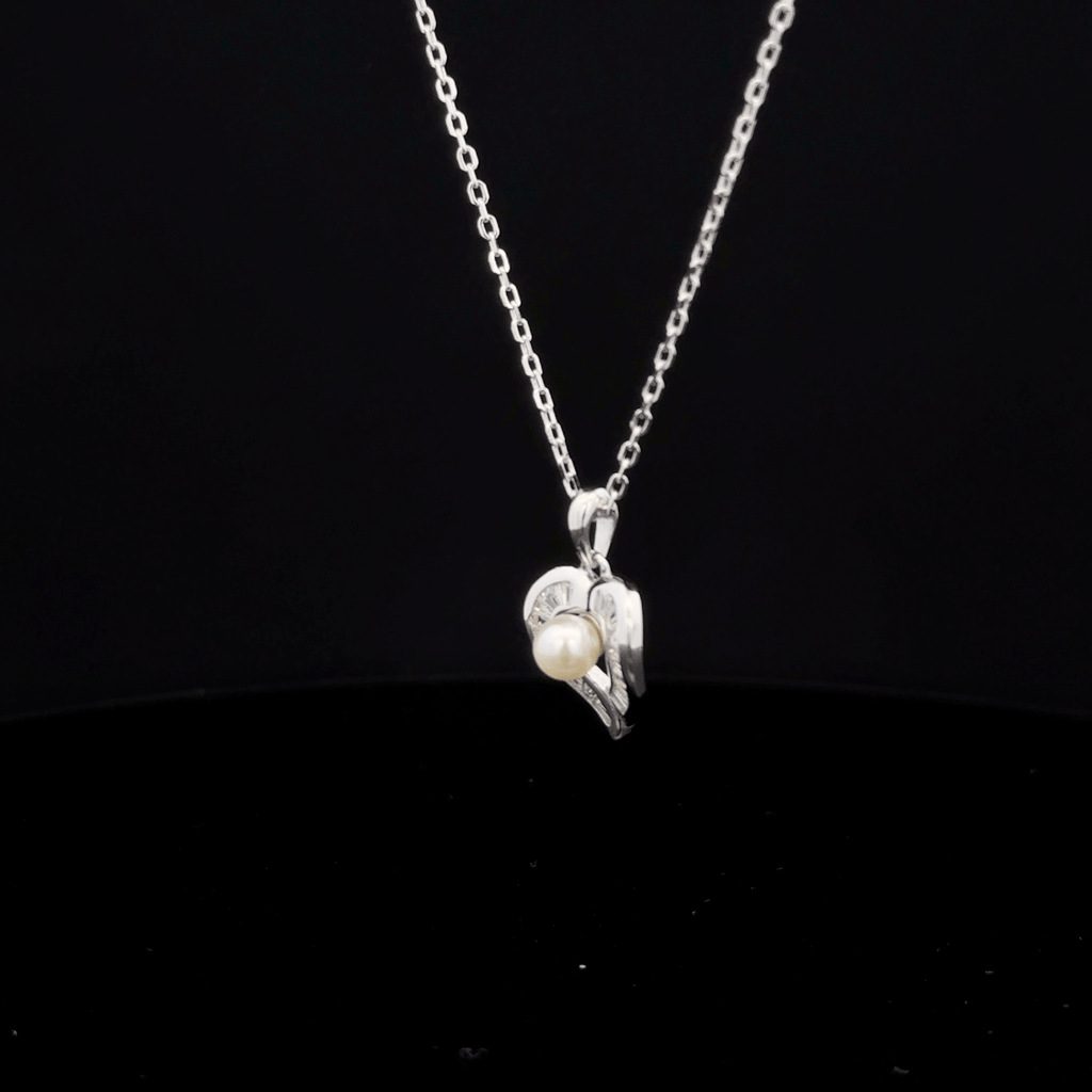 Heart with pearl