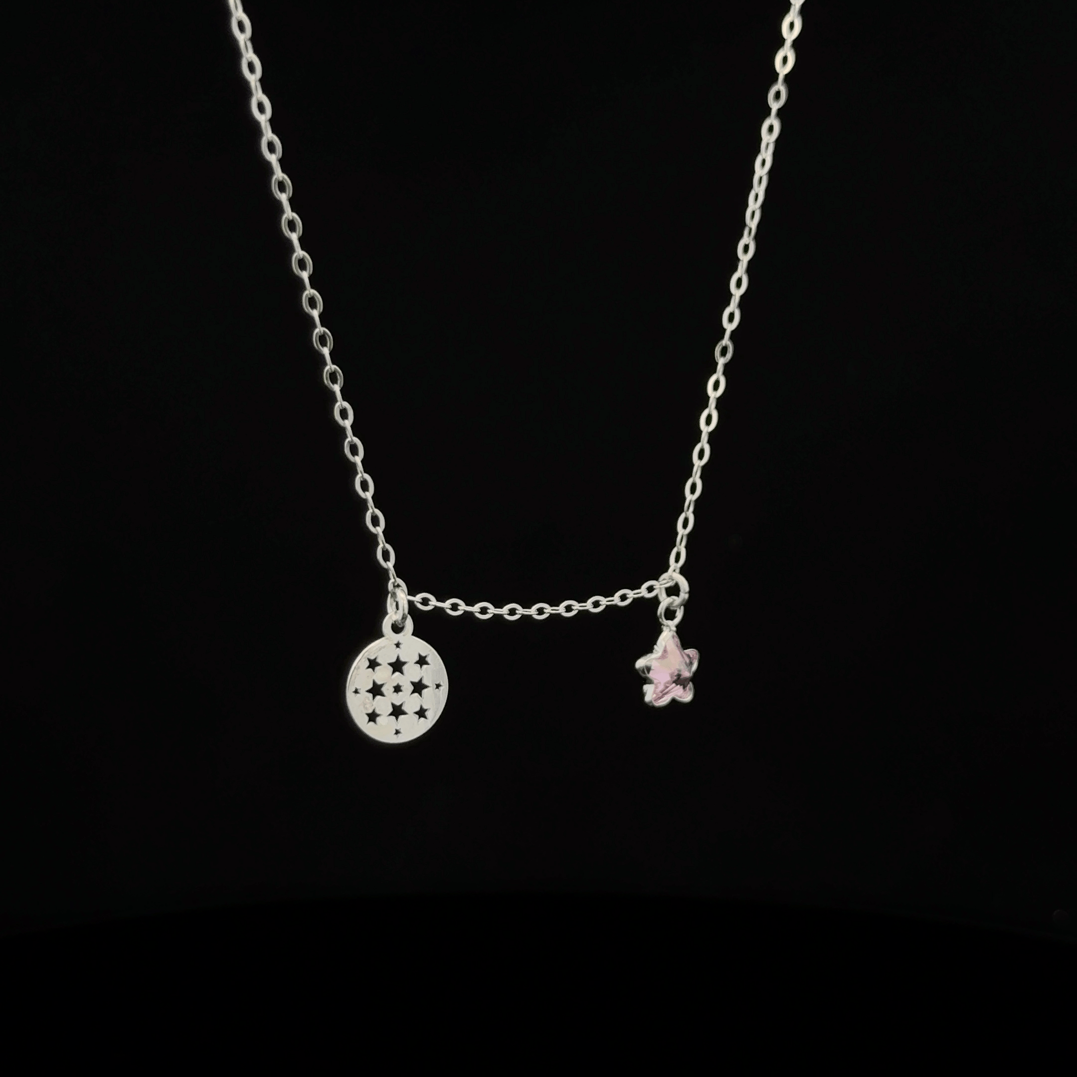 Silver chain with star and circle pendants
