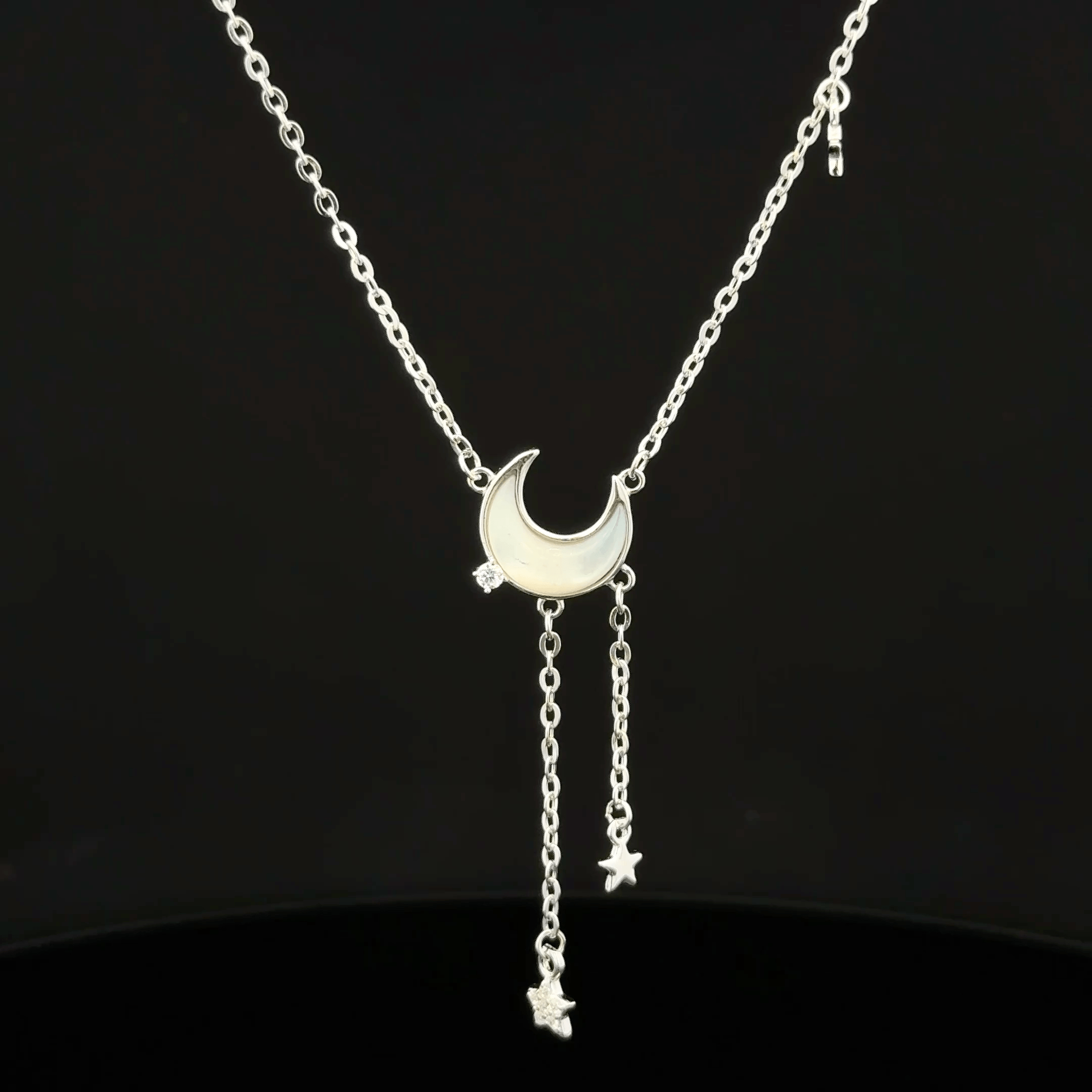 Halfmoon with hanging star chain pendant