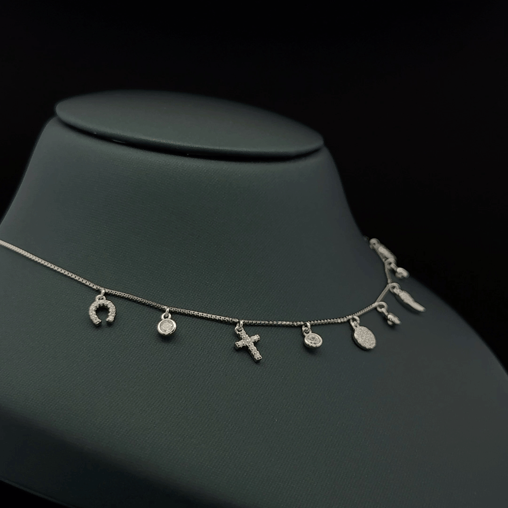 Multiple small dangling charms