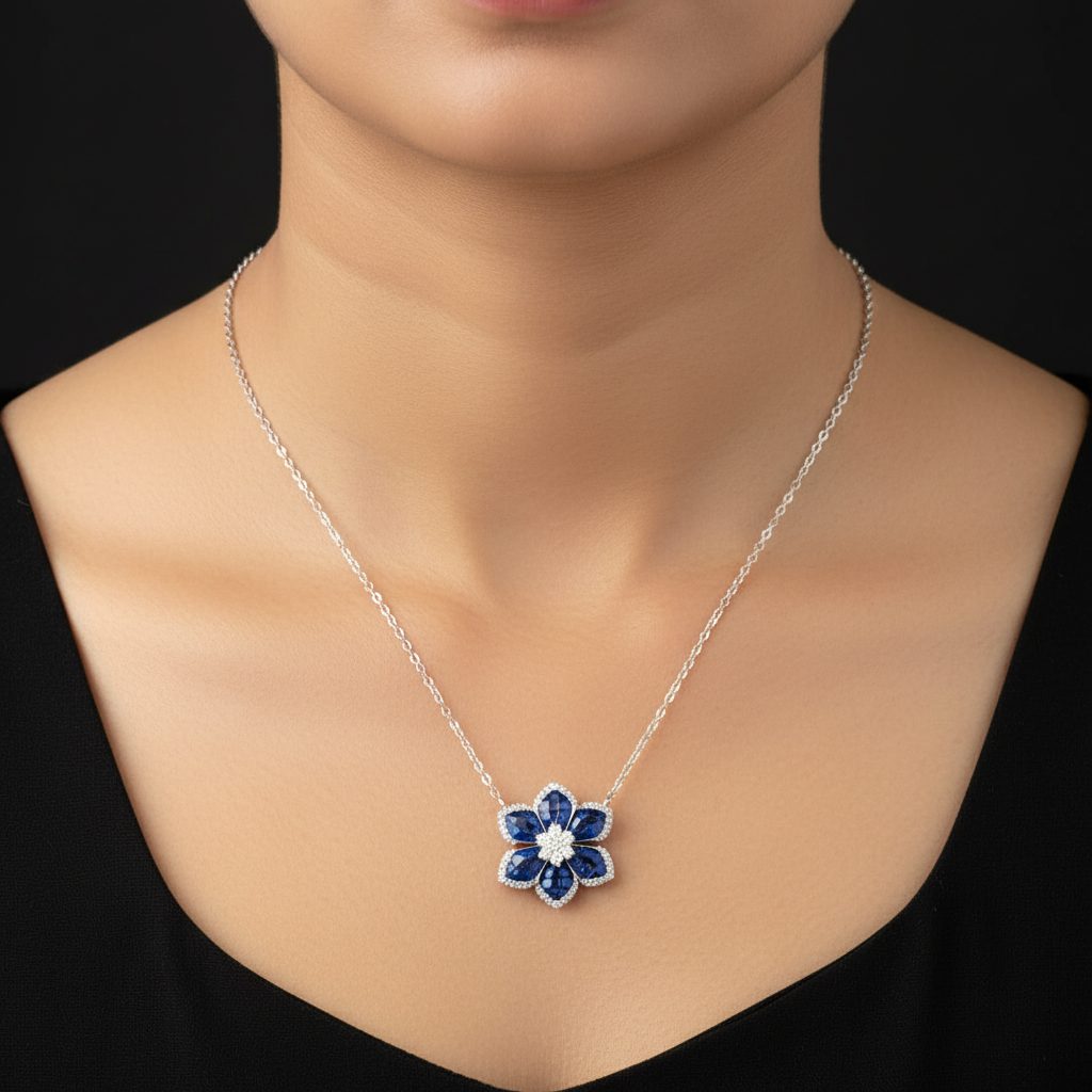Floral necklace with blue gemstones on a black background