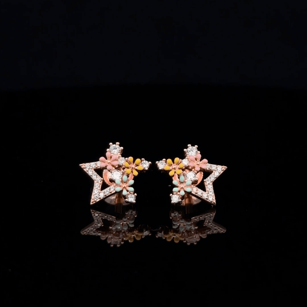 Rose gold star earrings