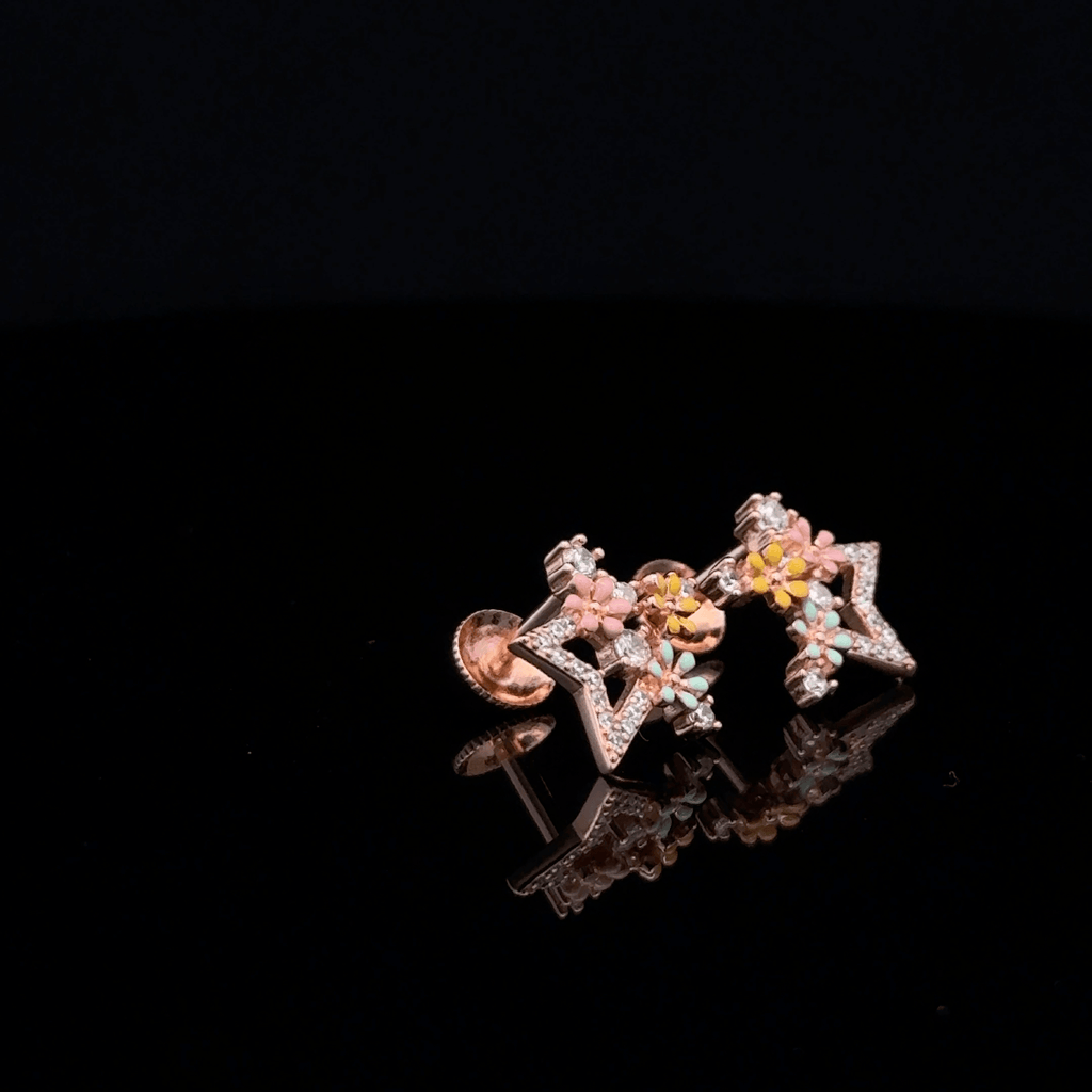 Rose gold star earrings