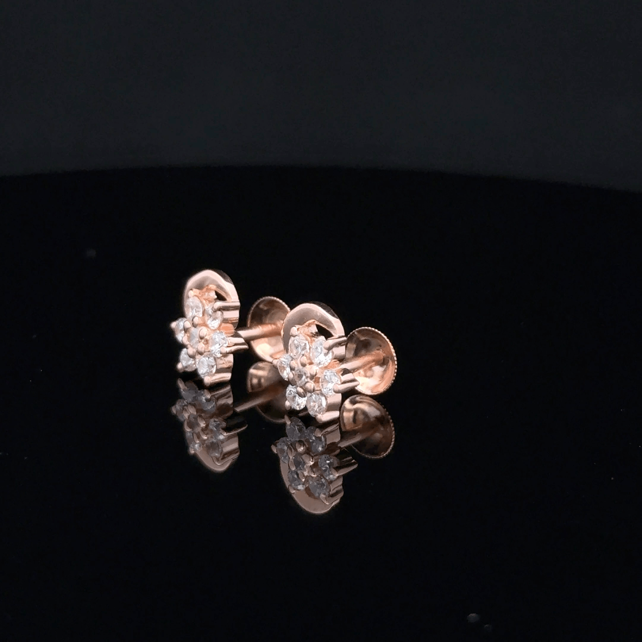 Rose gold star shape earrings