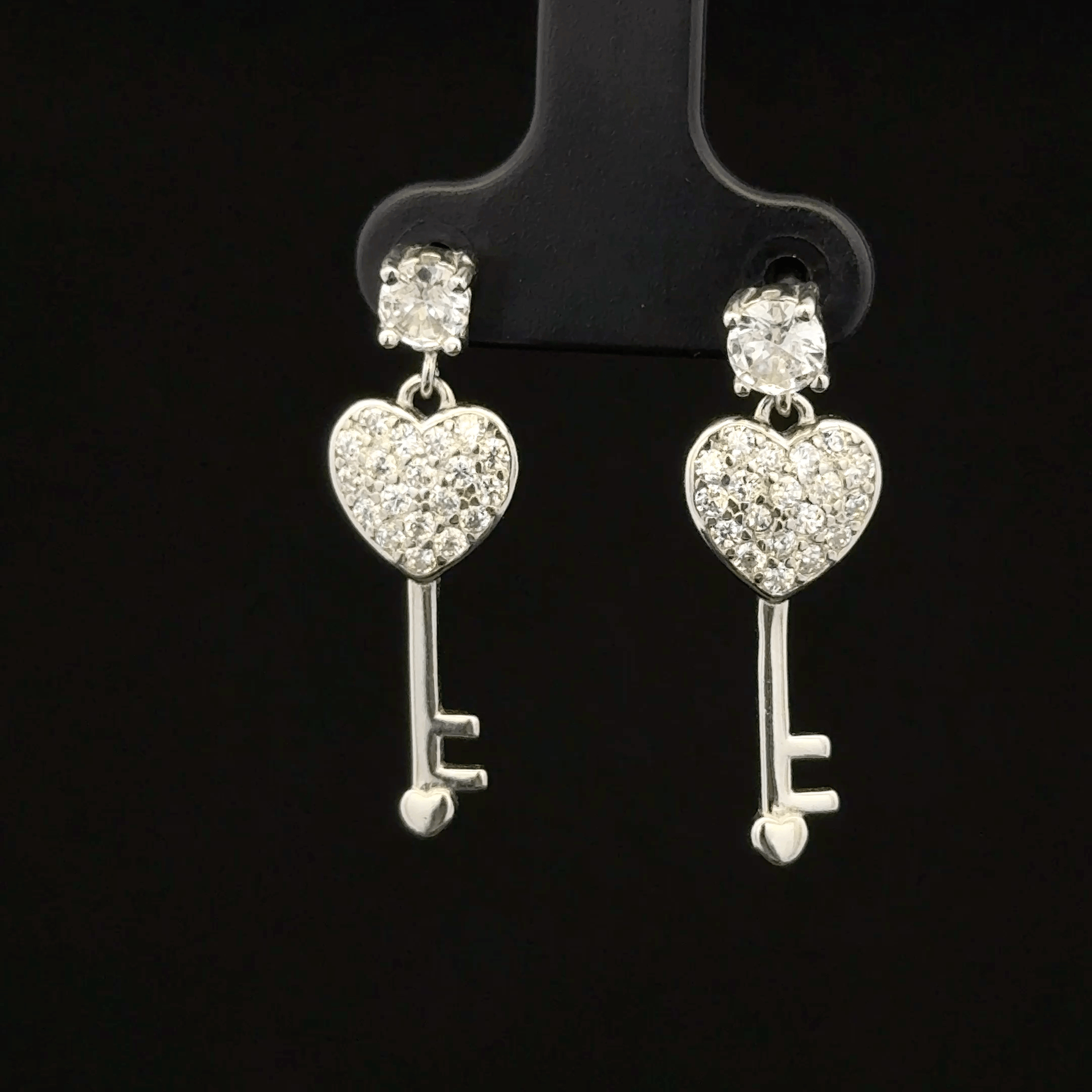 Heart and key shape earrings