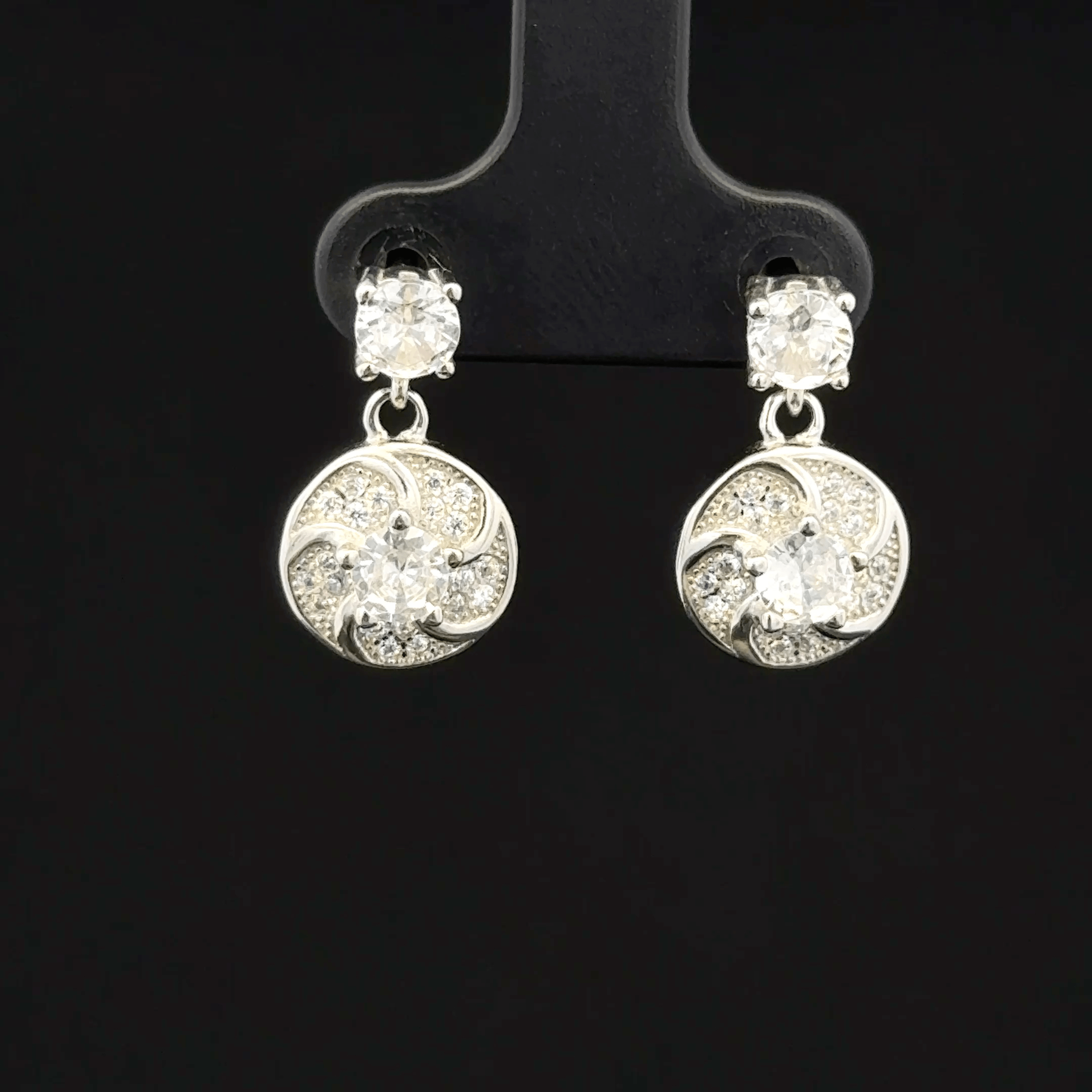 The Geometric Swirl Drops earrings