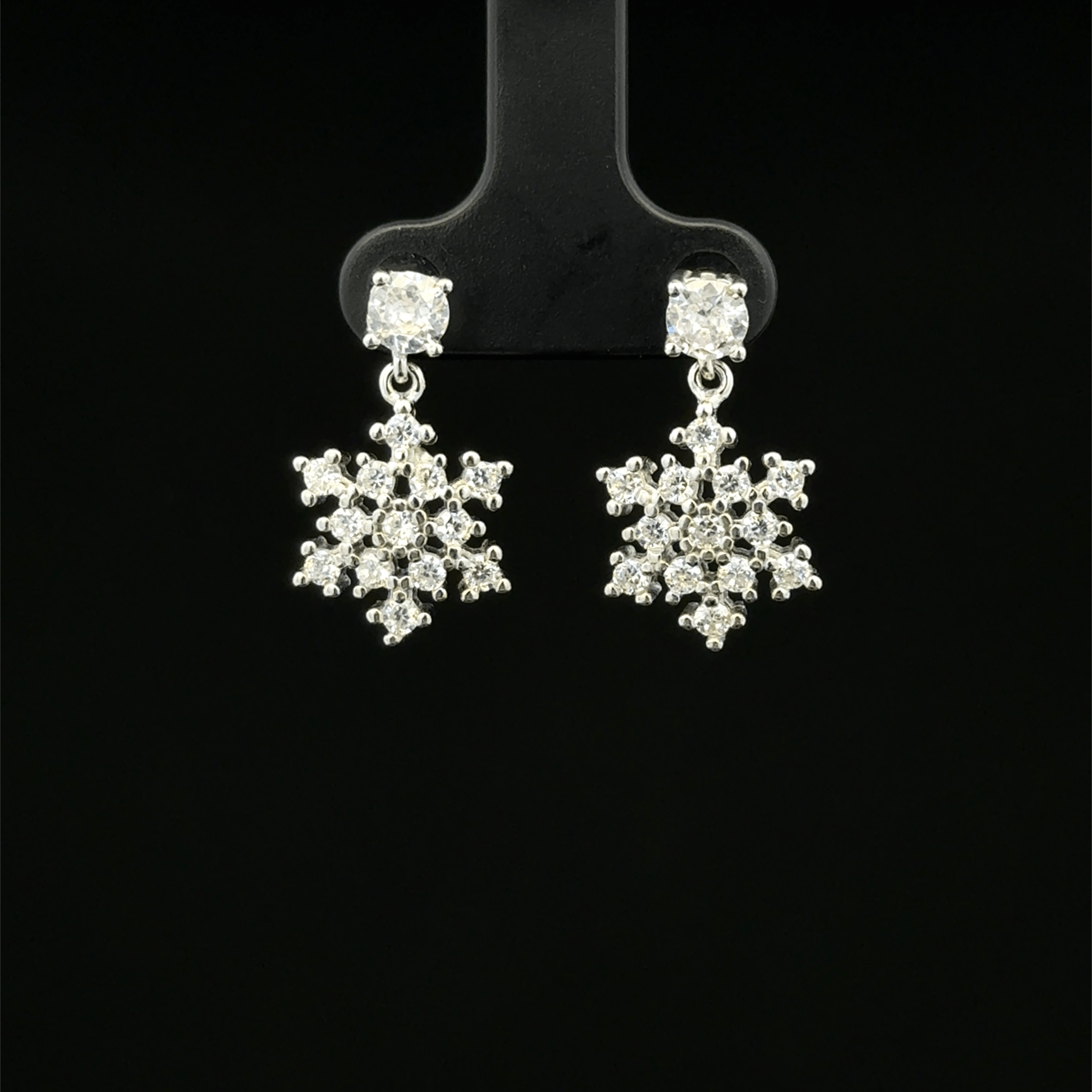 Snowflake-shaped drop earrings