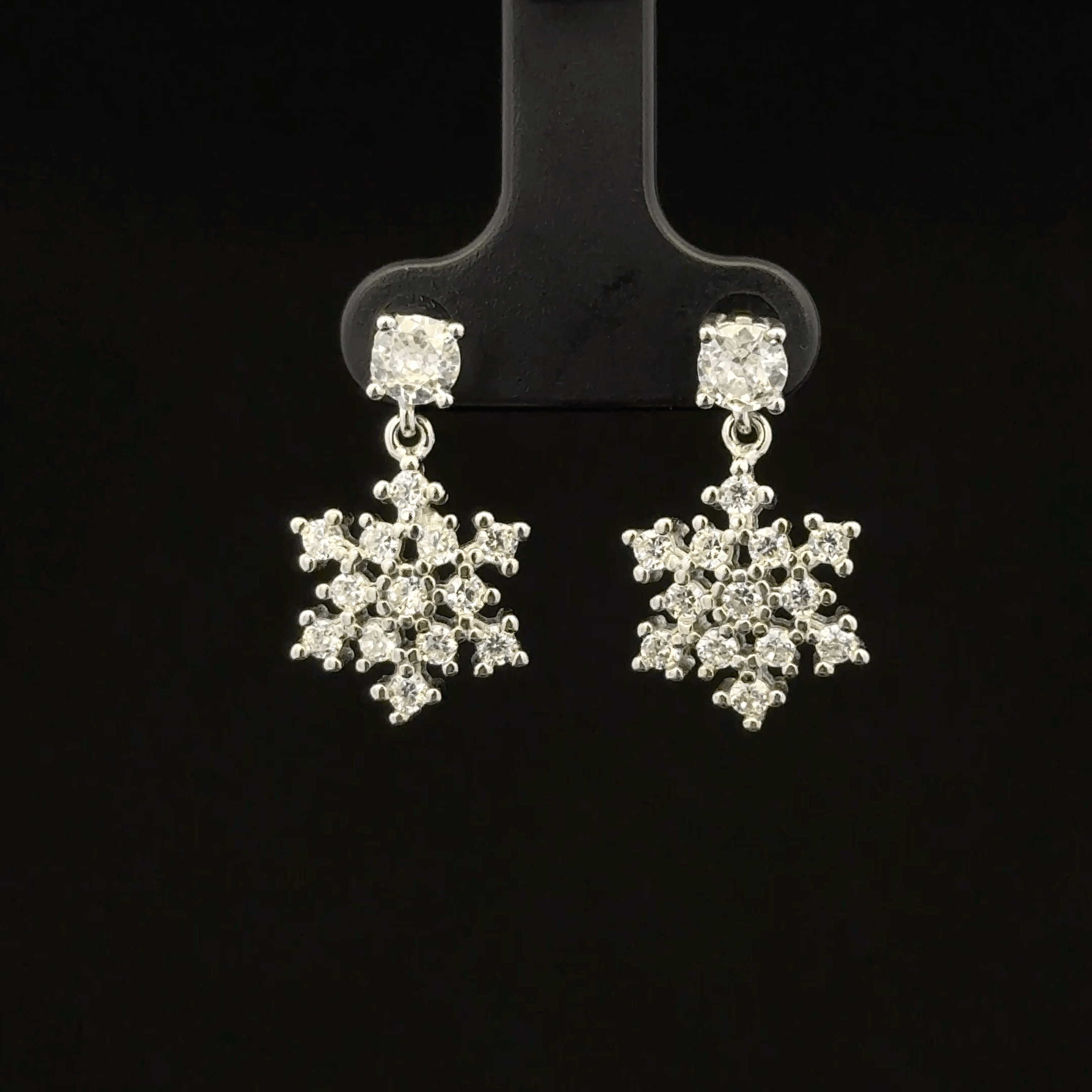 Snowflake-shaped drop earrings