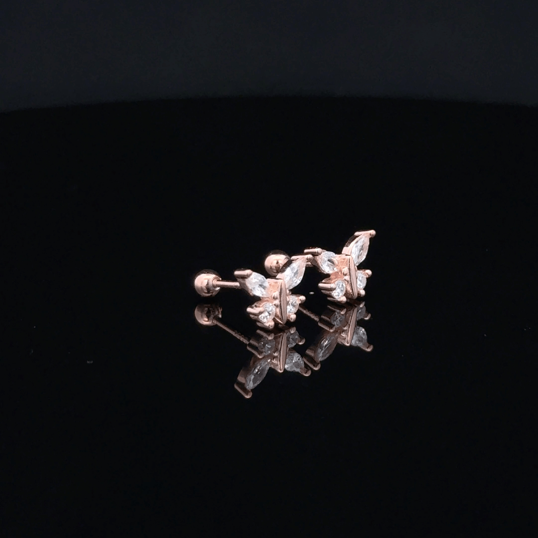 Rose gold butterfly second stud