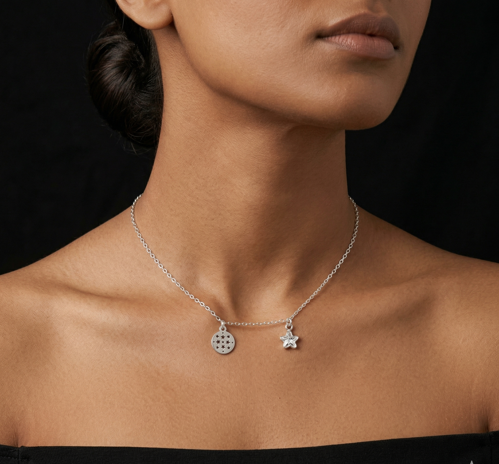 Silver chain with star and circle pendants