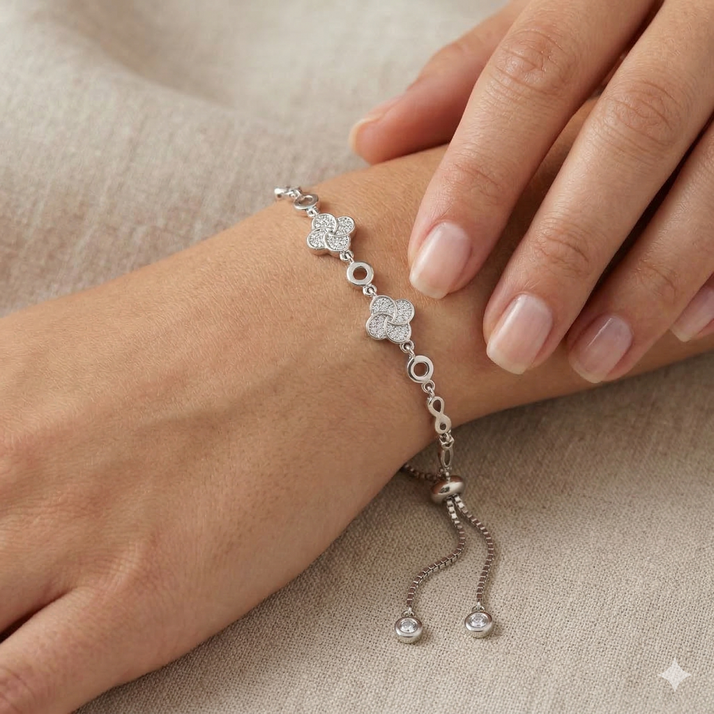 Rhodium clover and infinity charm bracelet
