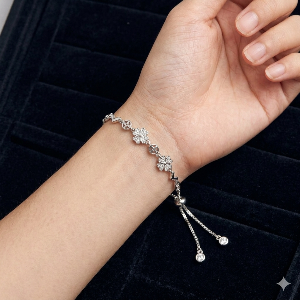 Rhodium clover and circle charm bracelet