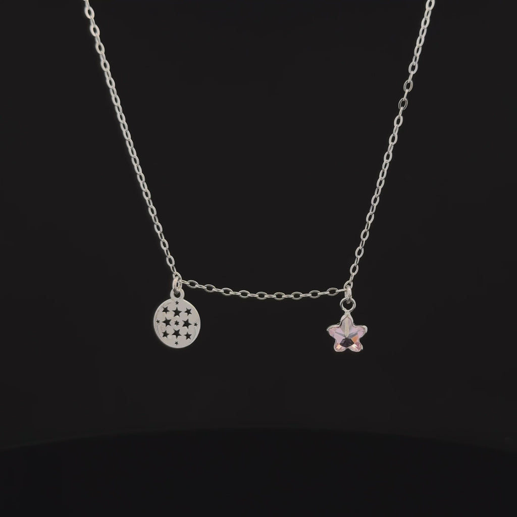 Silver chain with star and circle pendants