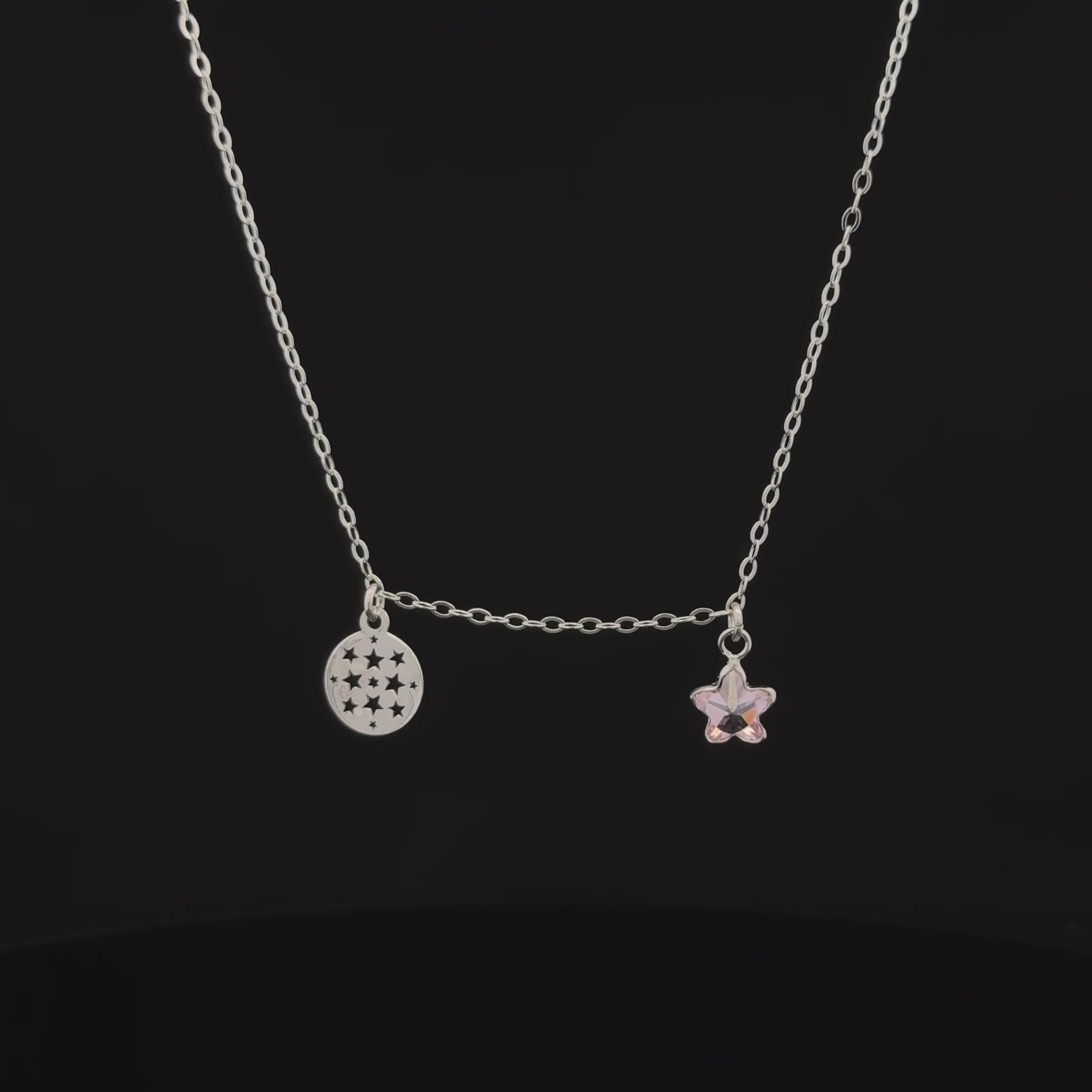 Silver chain with star and circle pendants