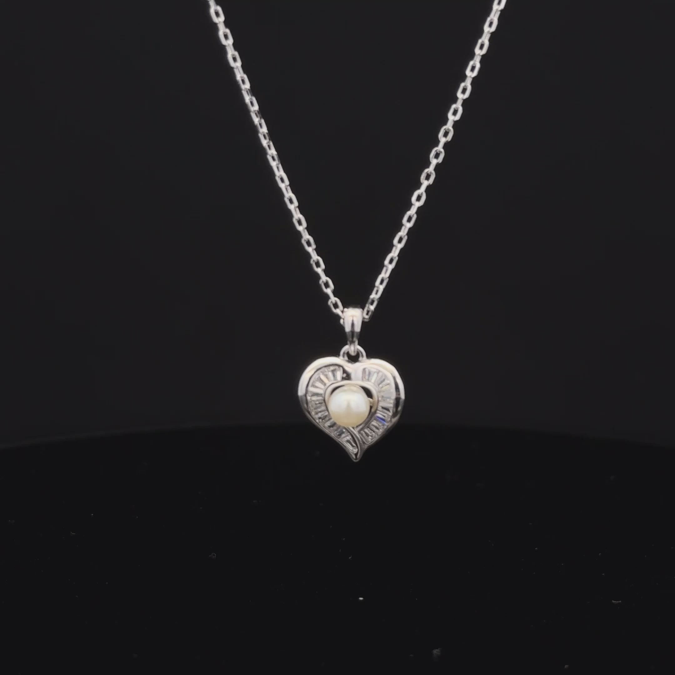 Heart with pearl