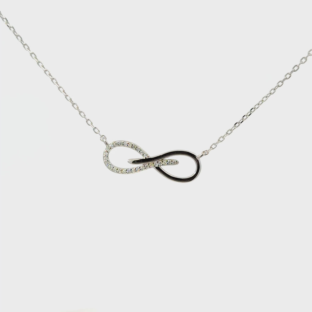Rhodium infinity cross pendent