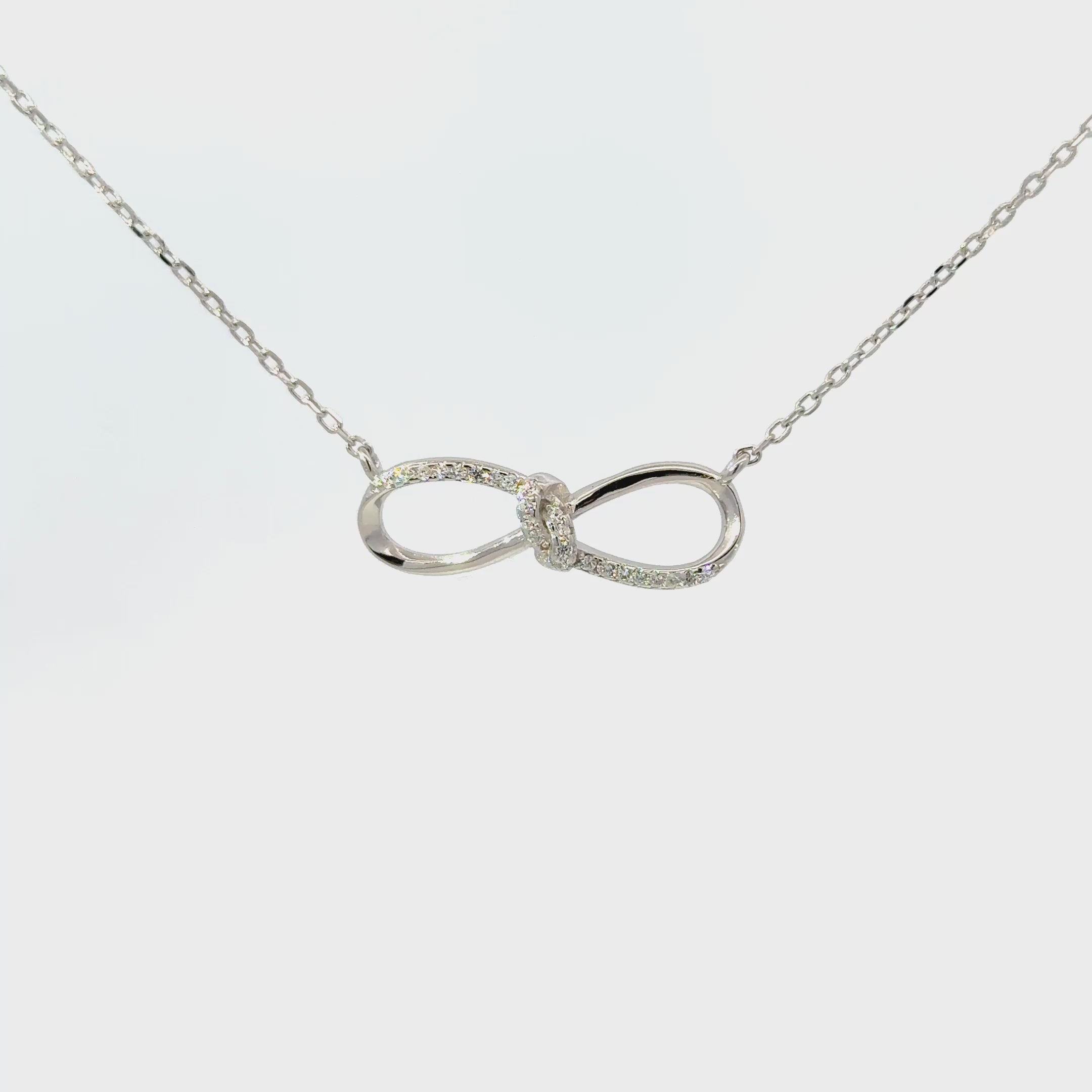 Rhodium infinity chain with pendent
