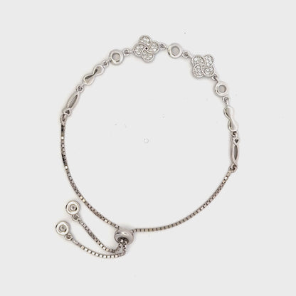 Rhodium clover and infinity charm bracelet