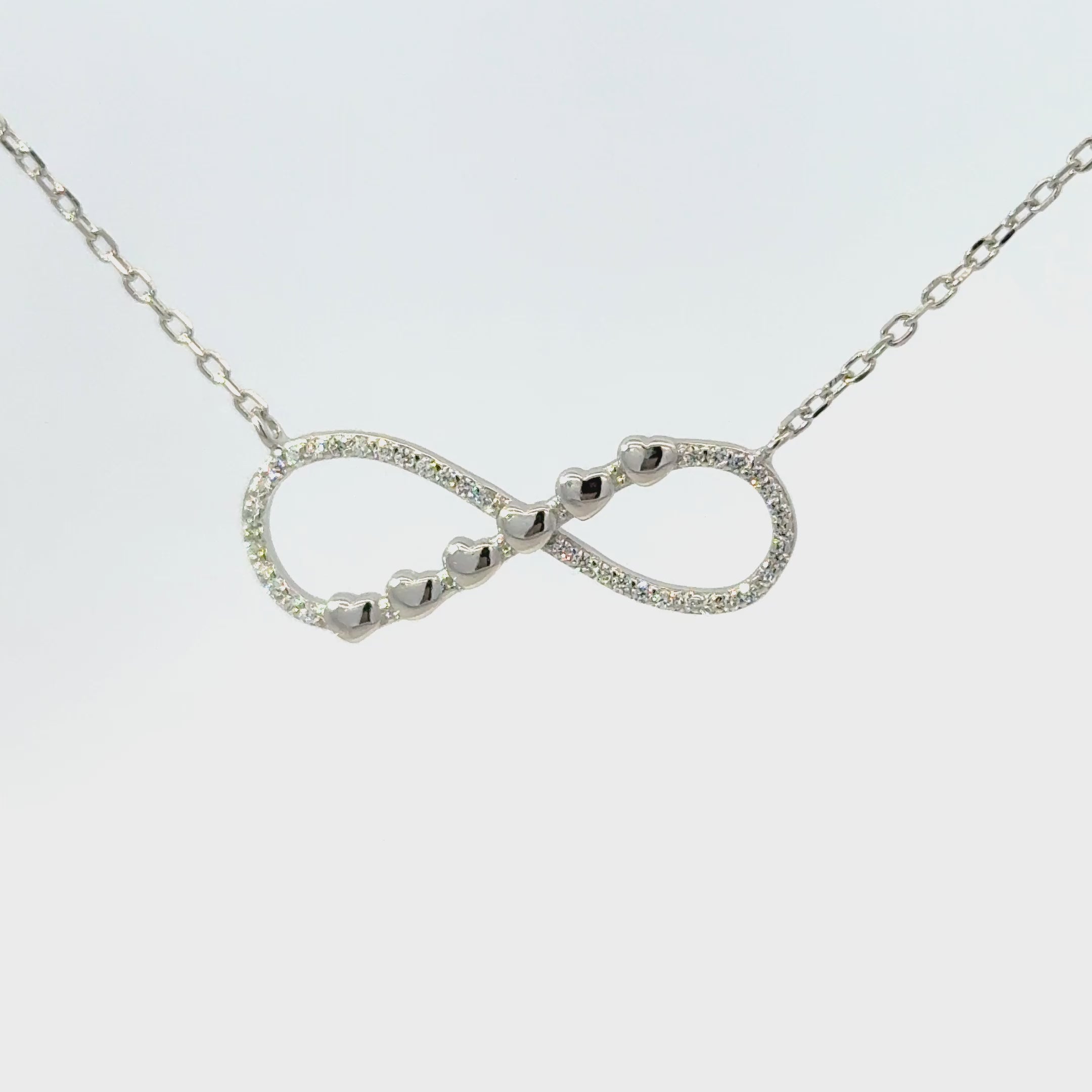 Rhodium mido infinity chain with pendent