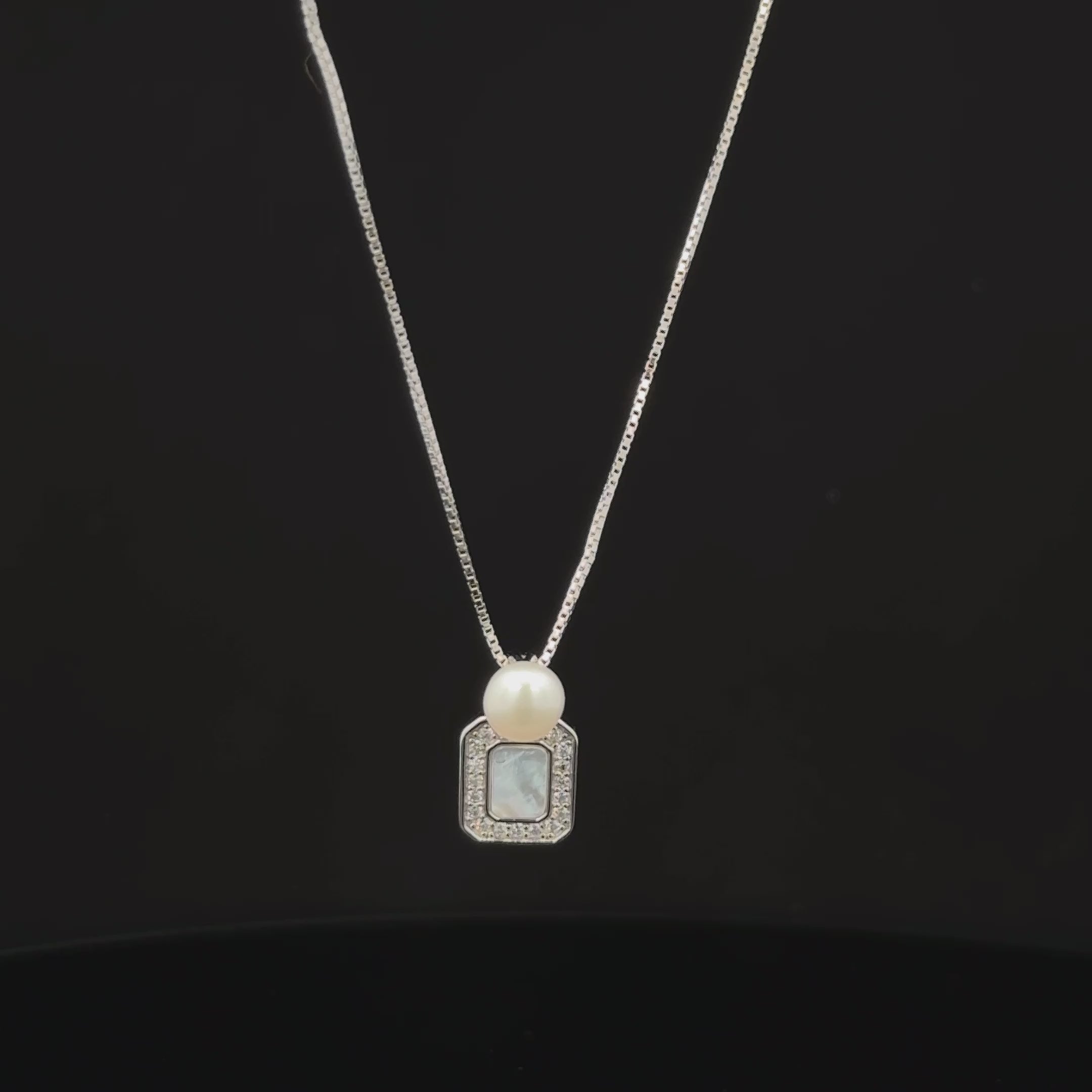 Elegant Pearl & Crystal Halo Pendant
